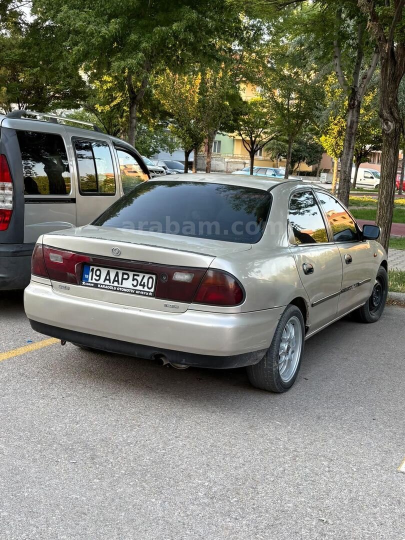 Sahibinden Mazda 323 1.8 Familia 1998 Model 3