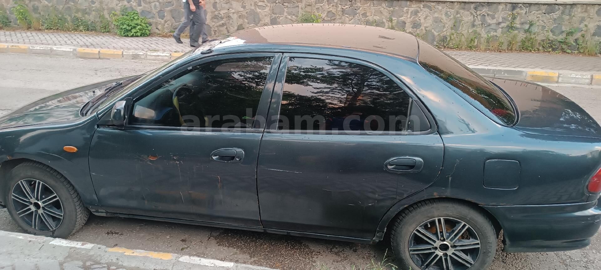 98 model mazda 323 1.5 doch motor 6