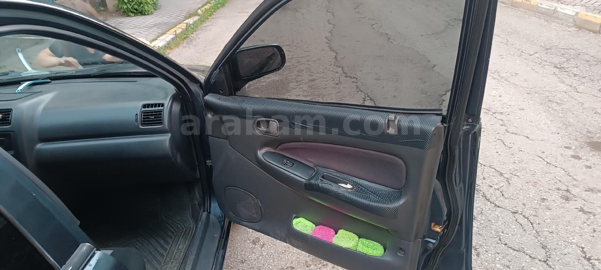 98 model mazda 323 1.5 doch motor 5
