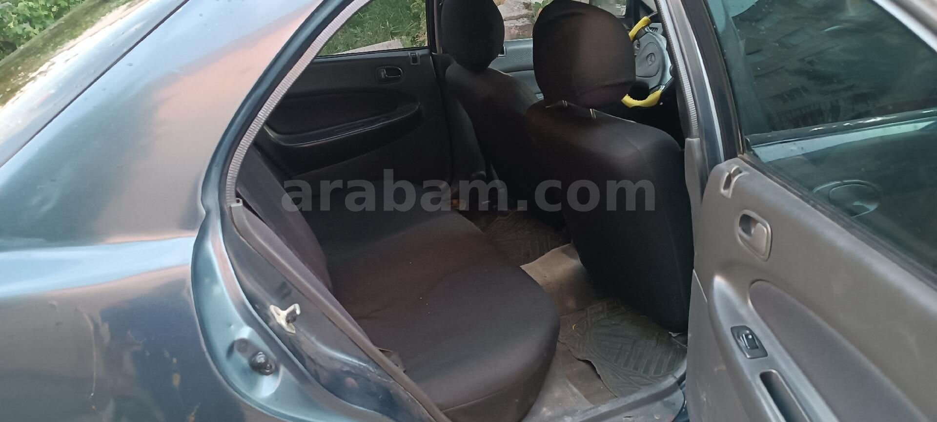 98 model mazda 323 1.5 doch motor 7