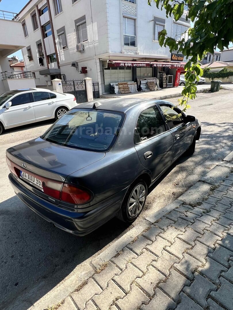Sahibinden Mazda 323 1.5 1998 Model 274.600 km Lacivert 6