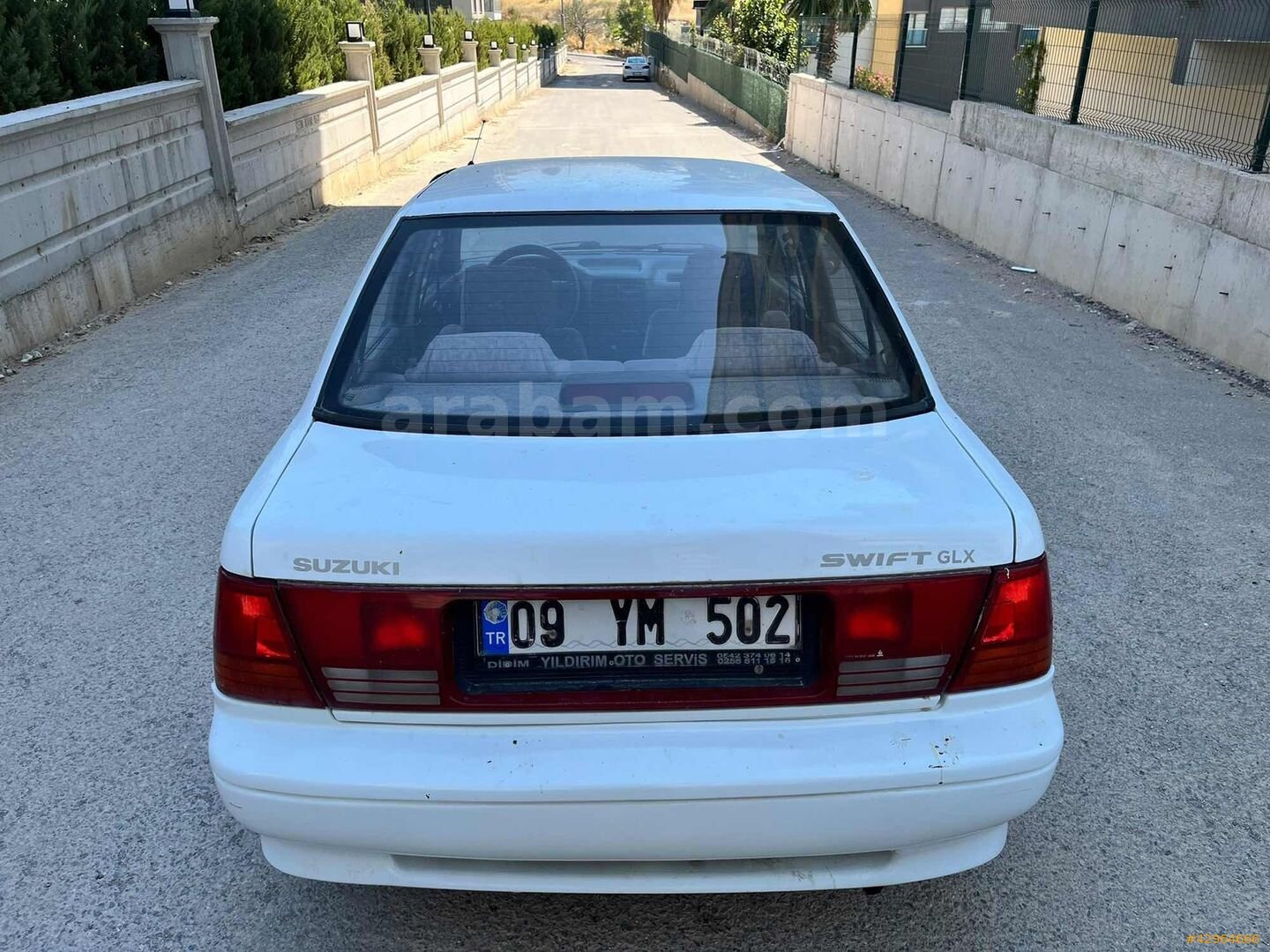 Galeriden Suzuki Swift 1.3 GLX 2000 Model İzmir 89.000 km Beyaz 6