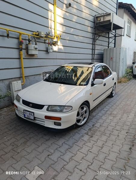 Sahibinden Mazda 323 1.8 Familia 1996 Model Kütahya 435.000 km Beyaz