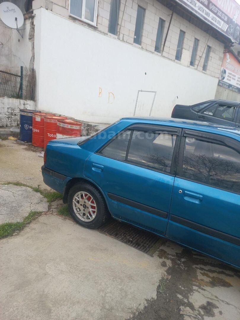 Sahibinden Mazda 323 1.5 Familia 1994 Model Kocaeli 460.000 km Yeşil (metalik) 3