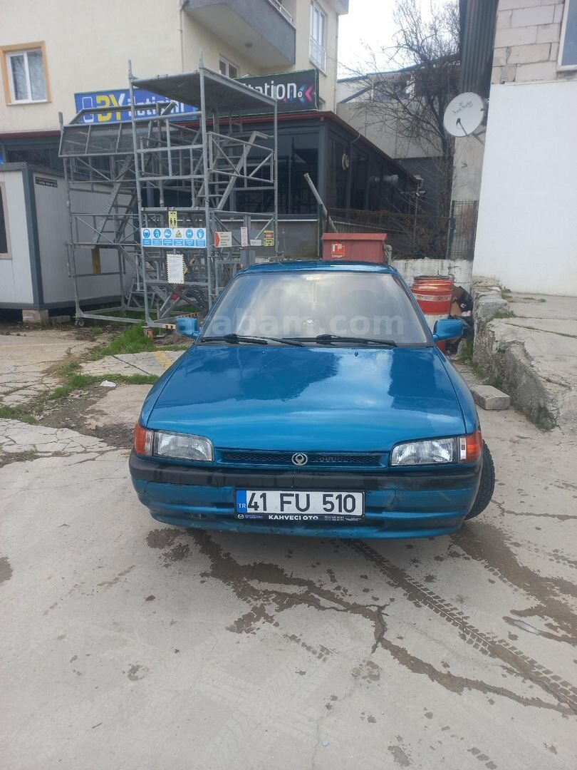 Sahibinden Mazda 323 1.5 Familia 1994 Model Kocaeli 460.000 km Yeşil (metalik) 1