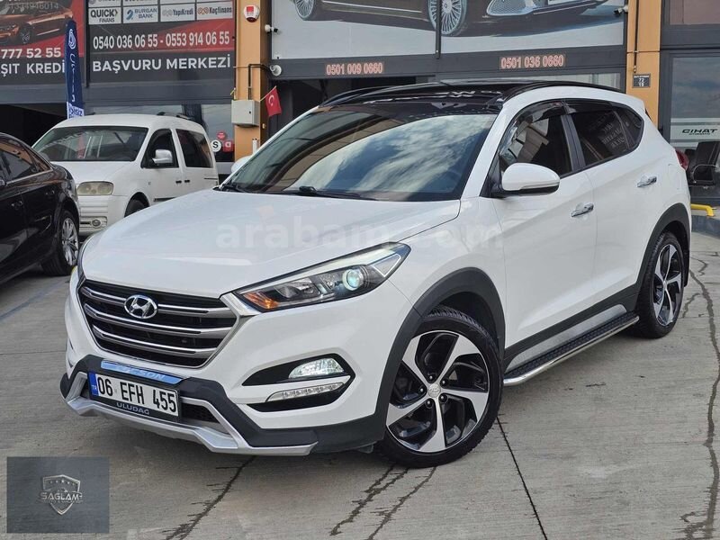 4x4 HATASIZ BOYASIZ TRAMERSİZ BEYAZ TUCSON FUL PAKT KKART TAKST