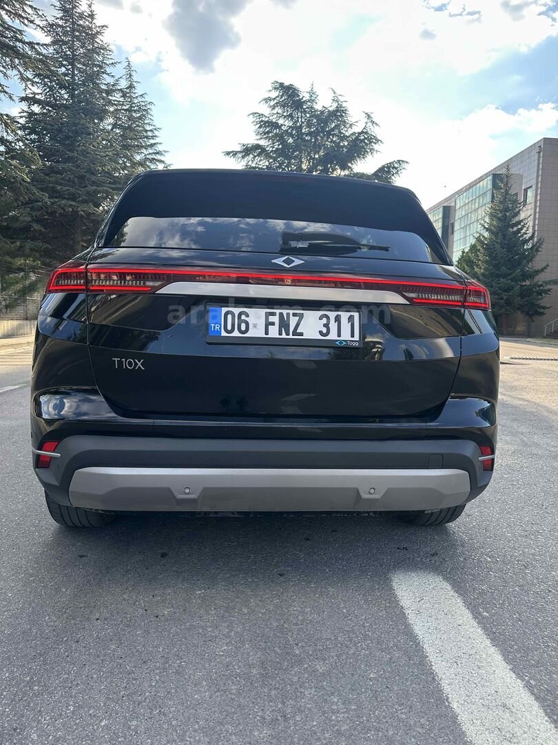 Hatasız boyasız full Ppf kaplı tertemiz uzun menzil Togg 4