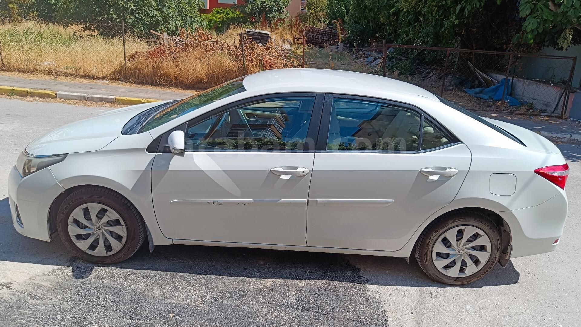 Sahibinden Toyota Corolla 1.6 Touch 2015 Model Balıkesir 242.000 km Beyaz 2
