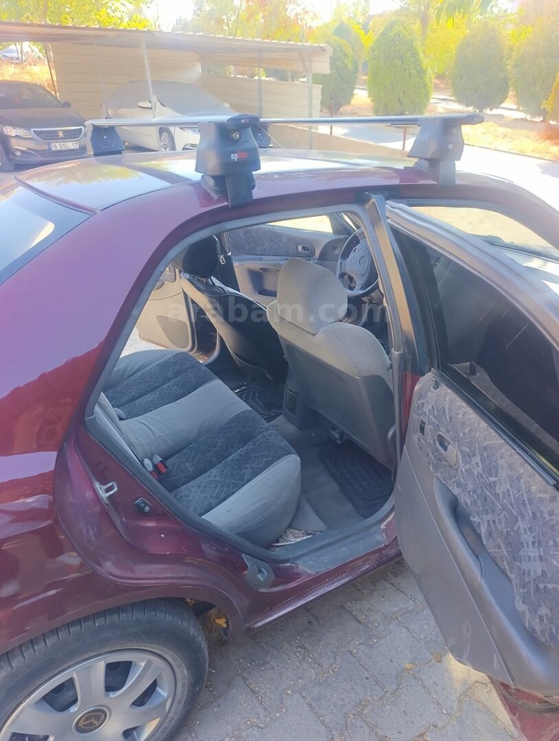 Sahibinden Mazda 323 1.5 Familia 2000 Model otomatik Full bakımlı al git istediğin yere 6