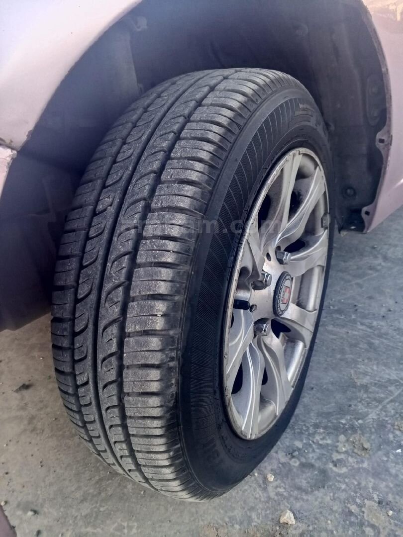 Sahibinden Daihatsu Cuore 1.0 High Grade 2004 Model İstanbul 246.000 km Pembe 5