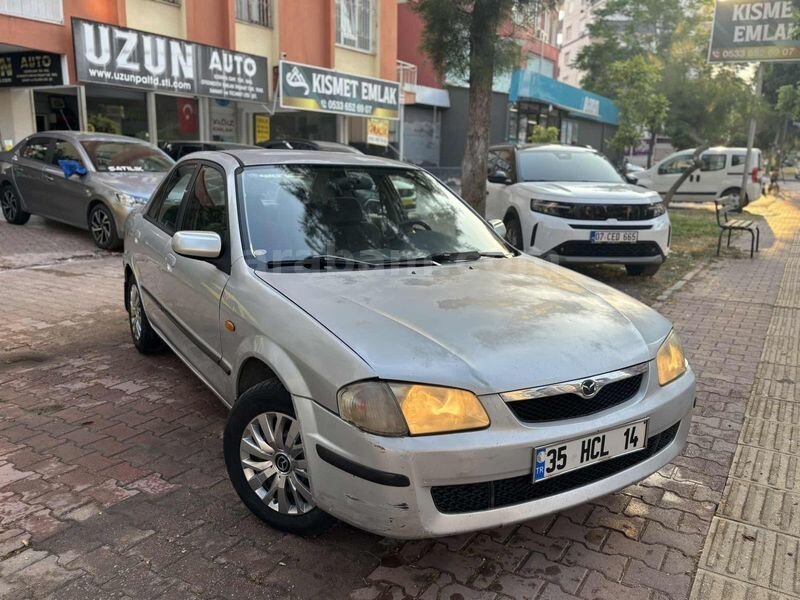 Galeriden Mazda 323 1.5 1.5i 1999 Model Antalya 265.000 km Gri