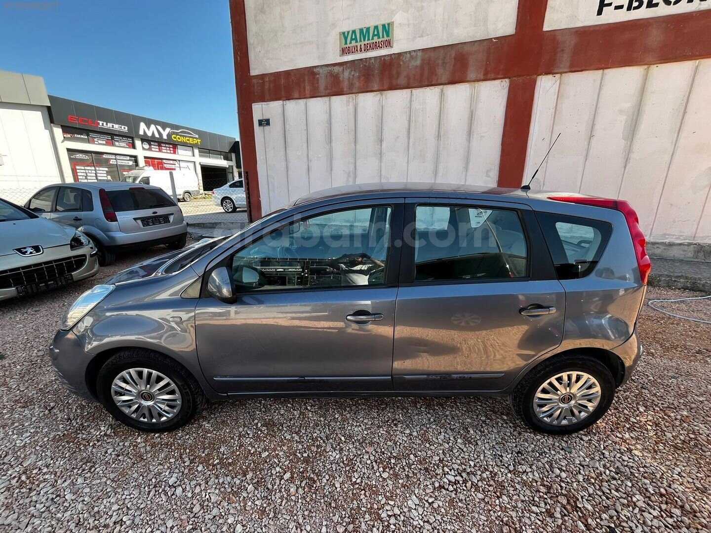 Özgüvendi Motors'dan Nissan Note Mor Fümesi İçi Bej 5
