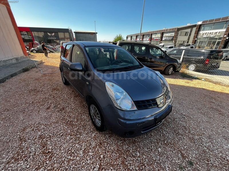 Özgüvendi Motors'dan Nissan Note Mor Fümesi İçi Bej