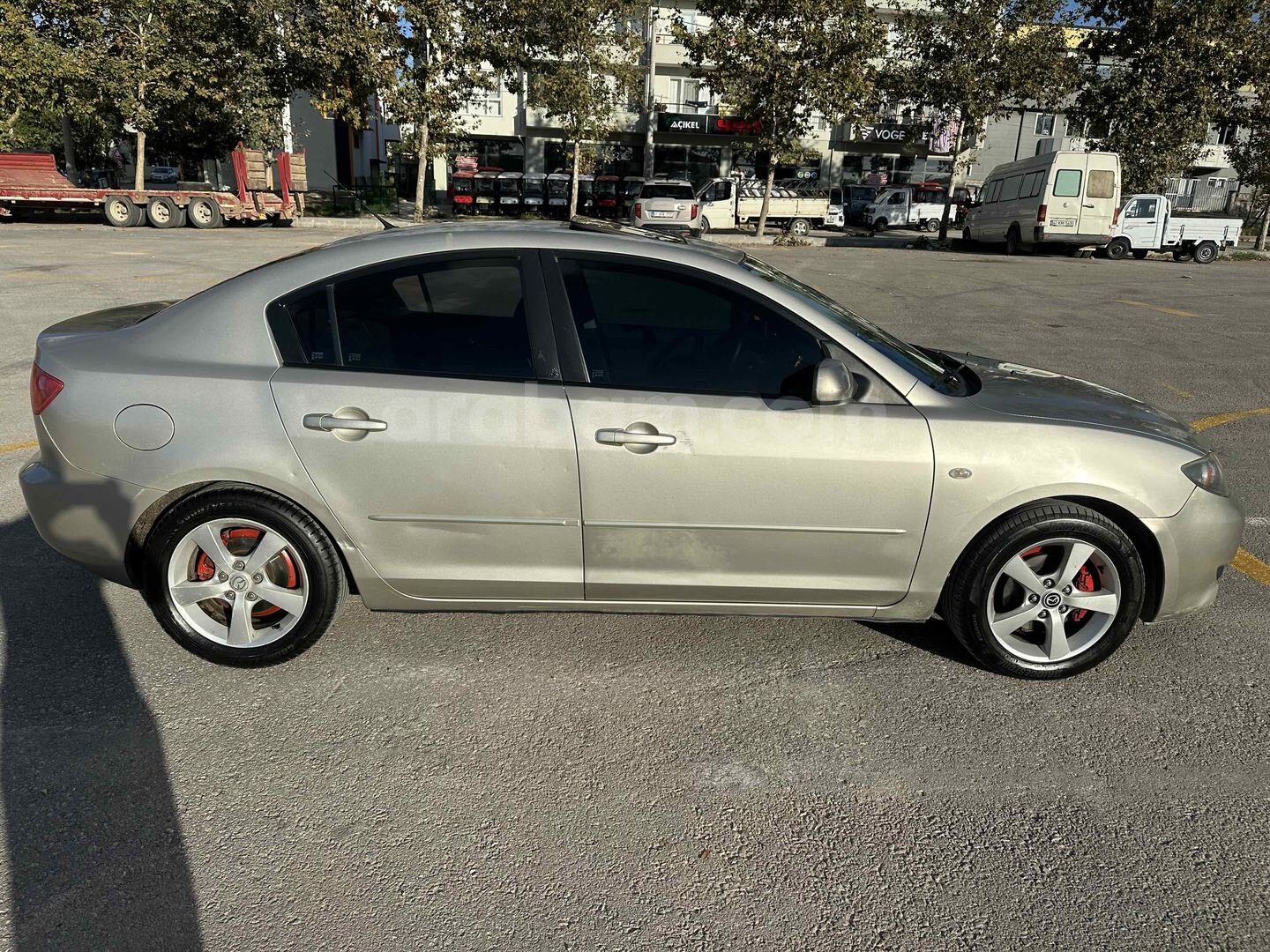 Sahibinden Mazda 3 otomatik vites tramer değişen yok sunroof 1.6 Dynamic 2004 Model 284.000 km Şampanya 2