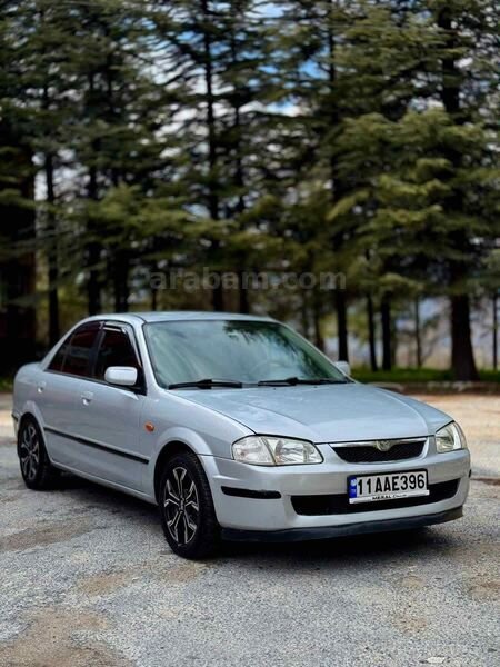 Sahibinden Mazda 323 1.5 Familia 1999 Model Kütahya 300.000 km Gri