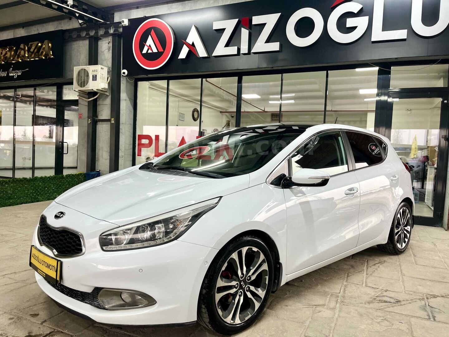 AZİZOĞLU PLAZA OTOMOTİV'DEN HATASIZ C.TAVAN O.PARK FUL PAKET KİA 7