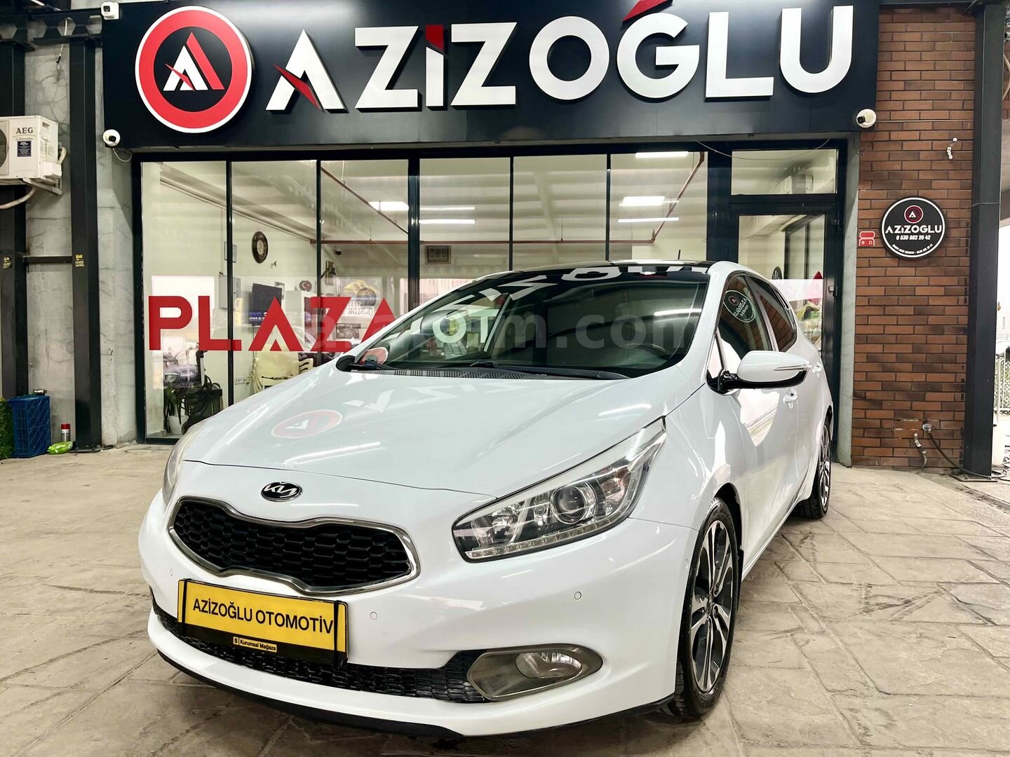 AZİZOĞLU PLAZA OTOMOTİV'DEN HATASIZ C.TAVAN O.PARK FUL PAKET KİA 5