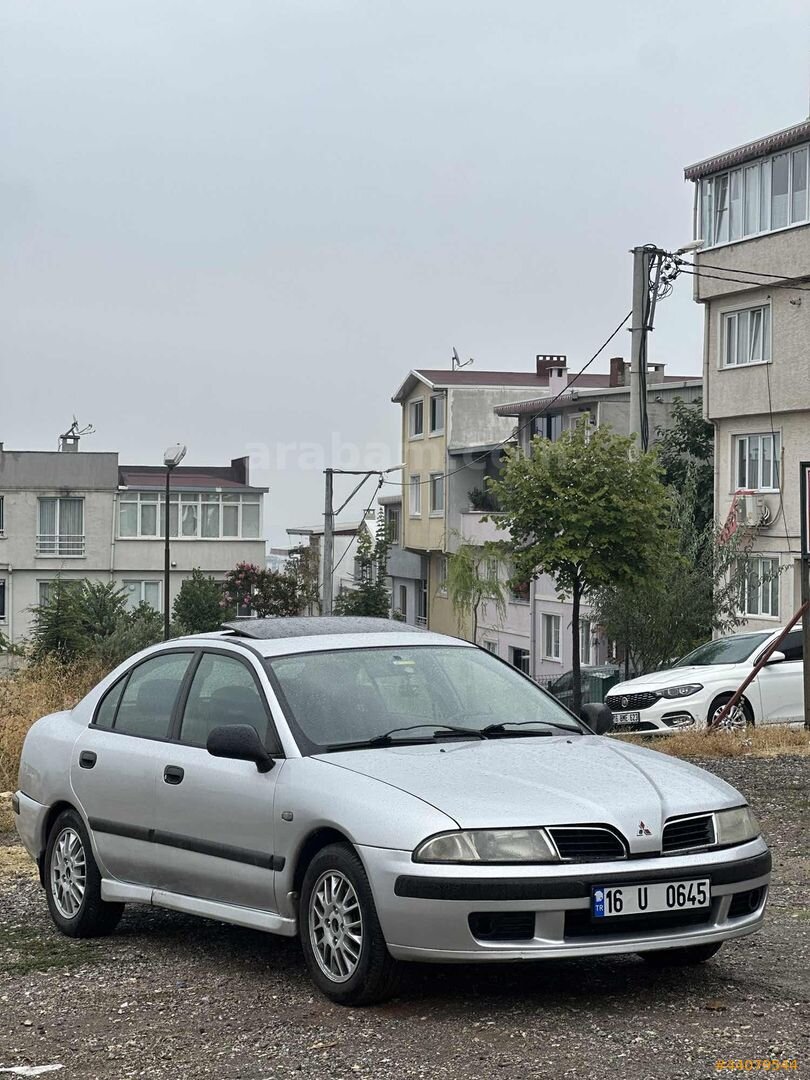 Galeriden Mitsubishi Carisma 1.6 Avance 2001 Model Bursa 328.000 km Gri 3