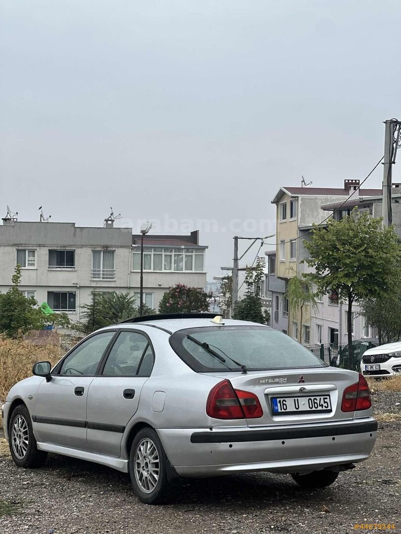 Galeriden Mitsubishi Carisma 1.6 Avance 2001 Model Bursa 328.000 km Gri 4