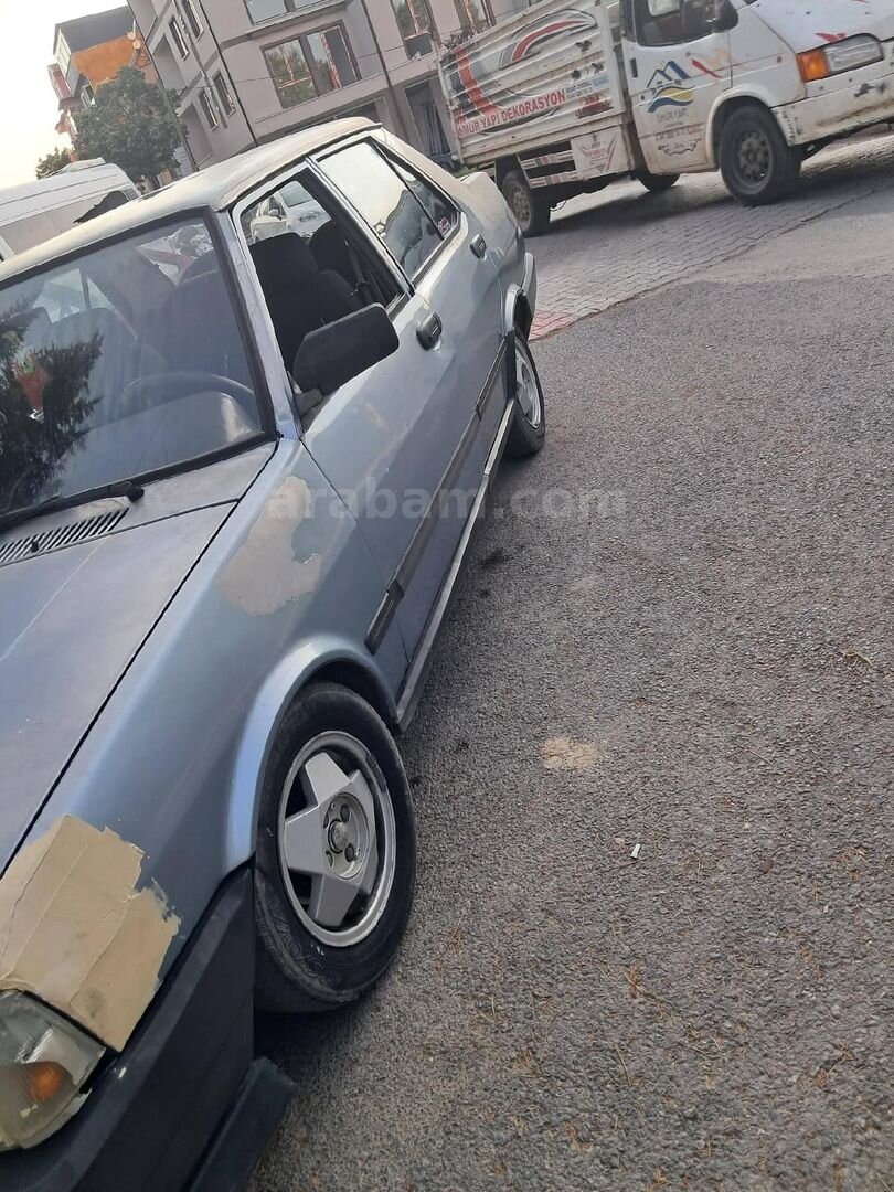 Sahibinden Tofaş Doğan L 1990 Model Afyonkarahisar 28.060 km Mavi (metalik) 4