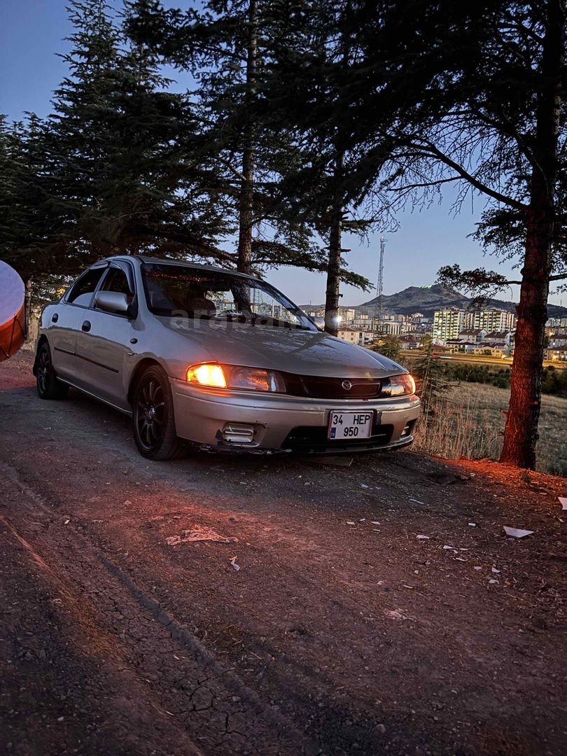 Sahibinden Mazda 323 1.5 Familia 1998 Model Ankara 315.000 km Şampanya 2