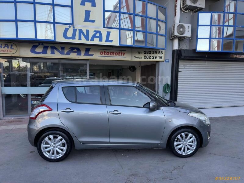 ÜNAL OTOMOTİV DEN 2016 SUZUKİ SWİFT 1.2 TAM OTOMATİK 134000 KMDE 7