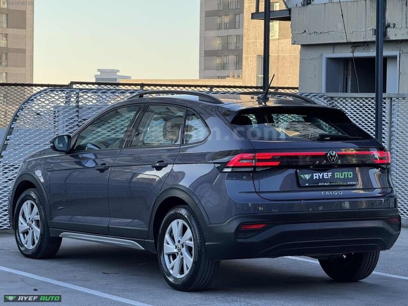 82 BİN KM'DE 2023 TAİGO 1.0TSI LİFE DSG-G.GRŞ KAMERA-HAYALET 7