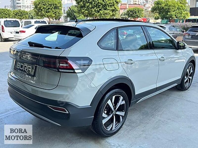 BORA MOTORS 2025 TAİGO 1.0TSİ STYLE 13.500Km CAMTAVAN+ACC BOYASZ 4