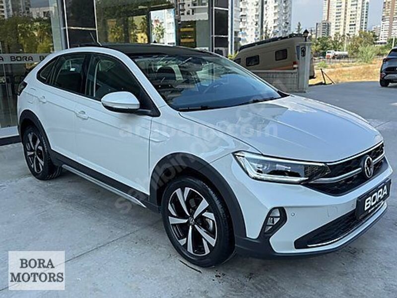BORA MOTORS 2025 TAİGO 1.0TSİ STYLE 13.500Km CAMTAVAN+ACC BOYASZ 2